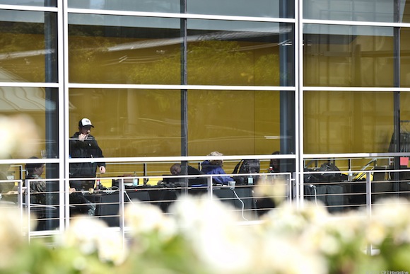Apple staff is set up on the second floor of the Novell Theater preparing for March 2 event